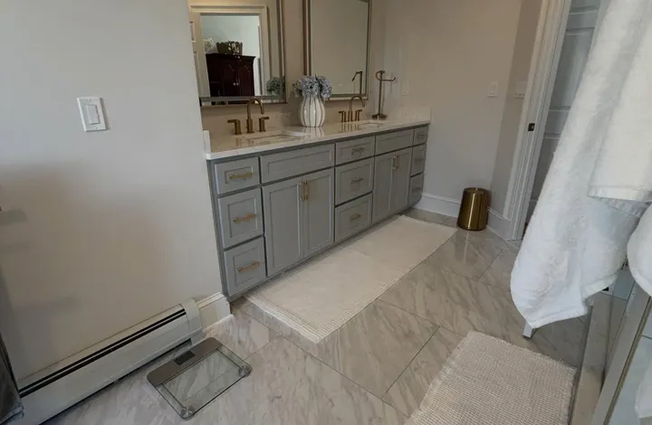 Double vanity installed in a completed bathroom remodel