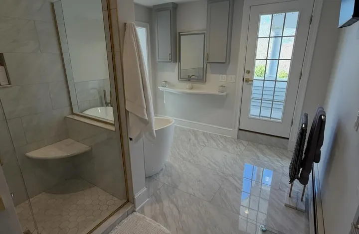 Wide view of a finished bathroom remodel