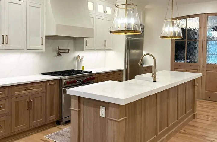Kitchen remodel with a white oak island and quartz countertop in Haddam, CT