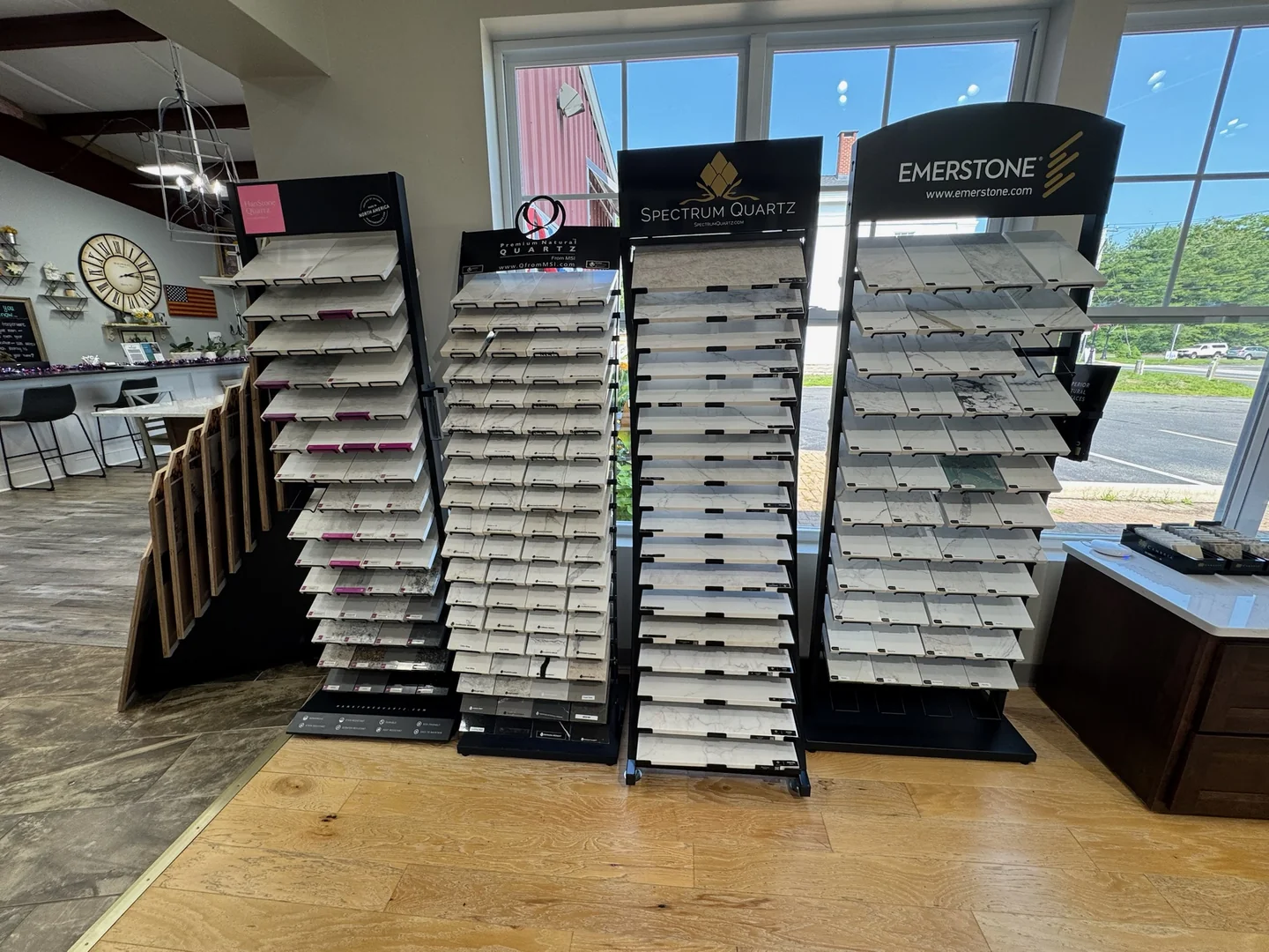 Quartz and natural stone countertop sample displays at the River's Edge Home Center showroom in Haddam, CT