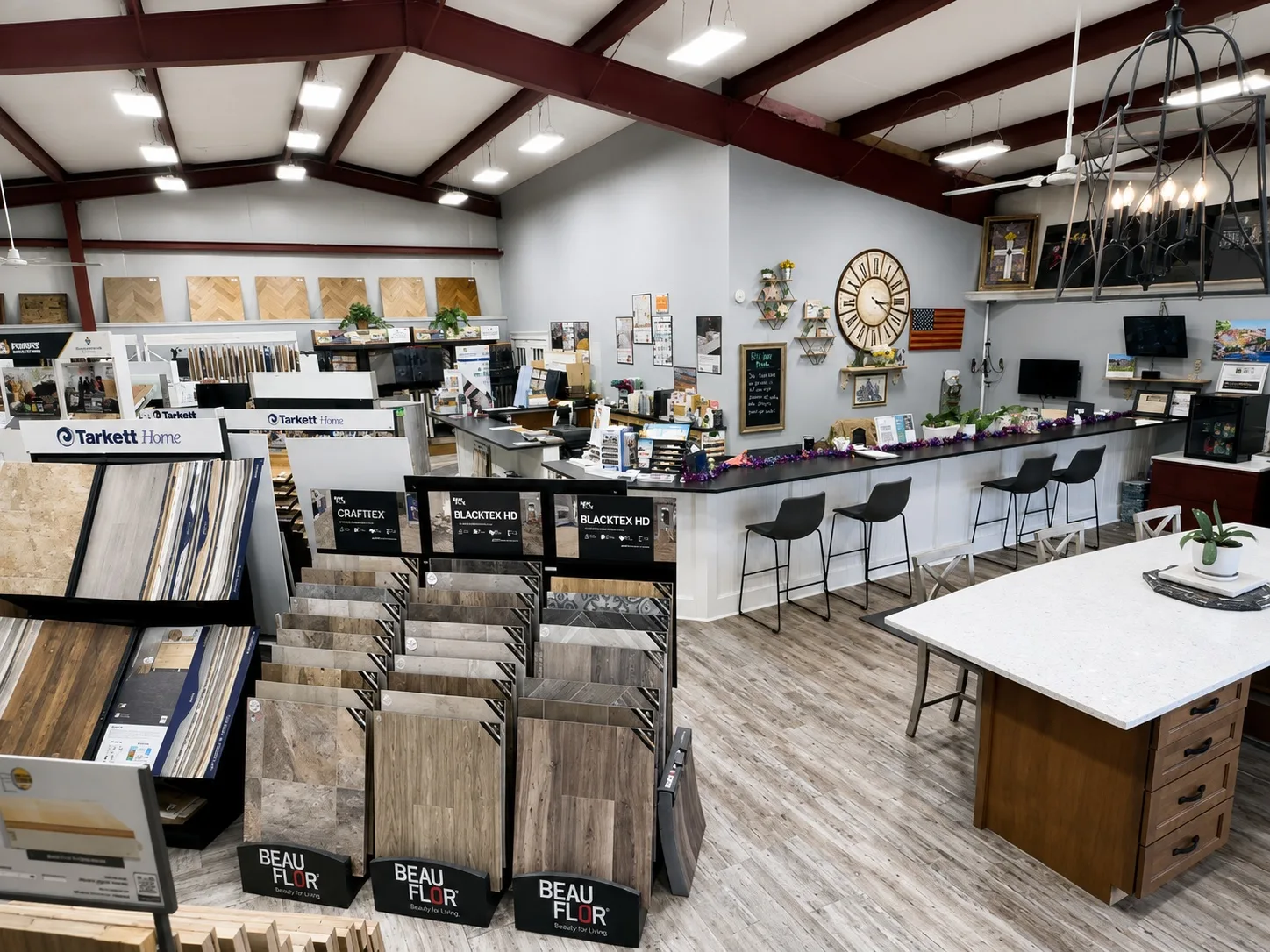 Flooring, tile and countertop displays across the River's Edge Home Center showroom in Haddam, CT