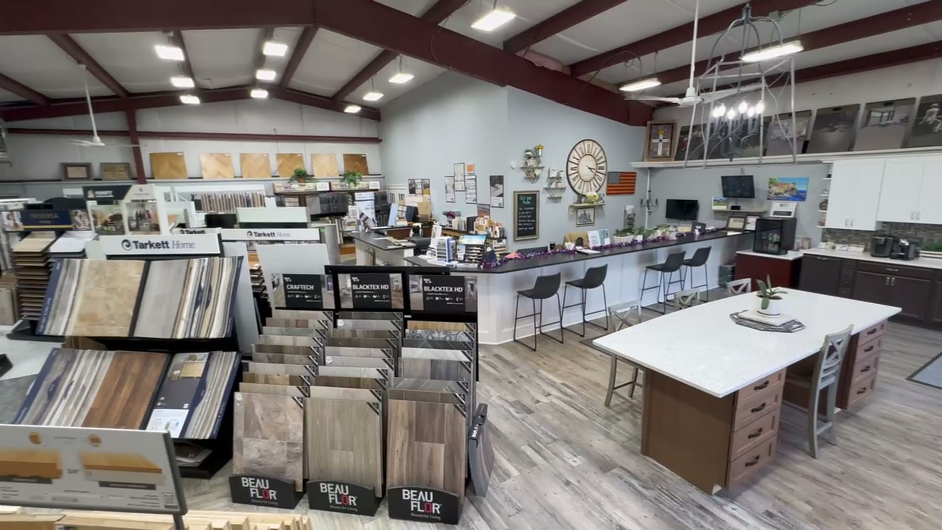 Flooring, tile and cabinet displays inside the River's Edge Home Center showroom